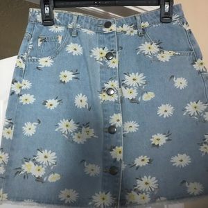 Denim skirt with floral print